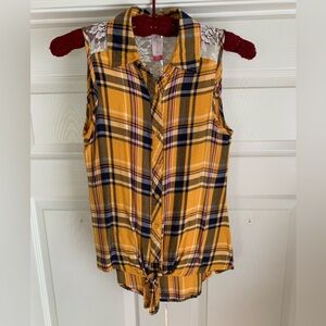 Sz sm Sleeveless button down shirt with tie bottom. Sheer lace at top of back